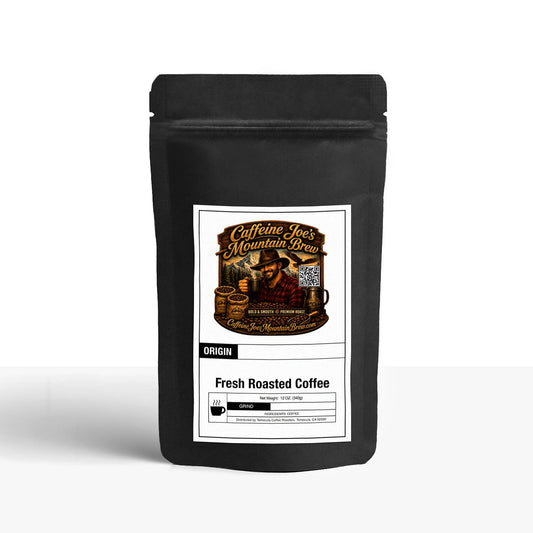 Caffeine Joe's Mountain Brew Breakfast Blend coffee bag with label showing 12oz packaging and branding.